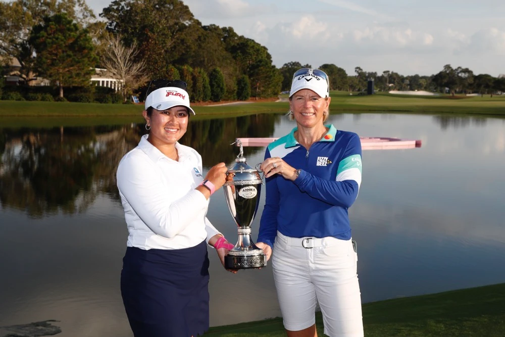 Lilia Vu, holds the champion trophy alongside Annika Sorenstam after winning an LPGA golf tournament, The Annika, Sunday in Belleair, Fla. (AP)