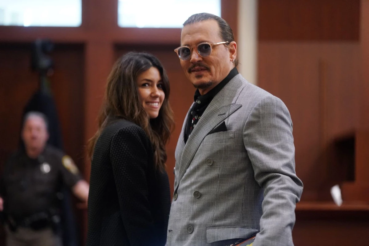 US actor Johnny Depp (R) and his attorney Camille Vasquez (L) during a break in the 50 million US dollar Depp vs Heard defamation trial at the Fairfax County Circuit Court in Fairfax, Virginia, on May 19, 2022. AFP