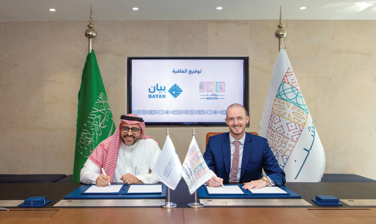 The agreement was signed by Iain Mcbride, head of commercial at ROSHN Group, and Talal Alshehri, chief business officer of Bayan.