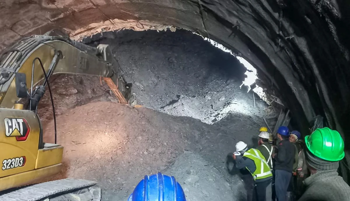 The tunnel, which was being built on a national highway that is part of a Hindu pilgrimage route, caved in around 5:30 a.m. on Sunday. (AFP)