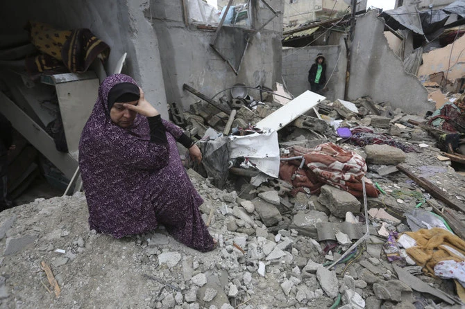 Palestinians look at destruction after Israeli strikes on Rafah, Gaza Strip on November 15, 2023. (AP)