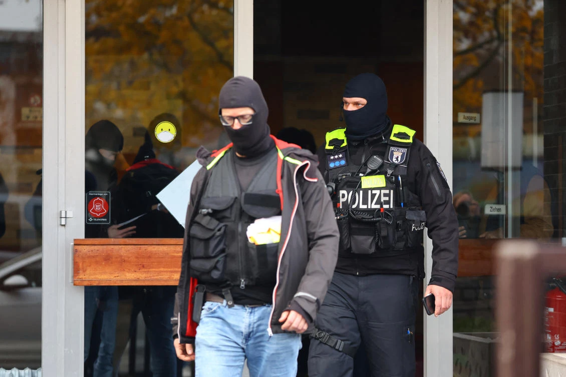 German police officers work during the raid of an Islamic center at Neukoelln district, following the Islamic Center Hamburg being under suspicion of supporting Hezbollah in Berlin. (Reuters)