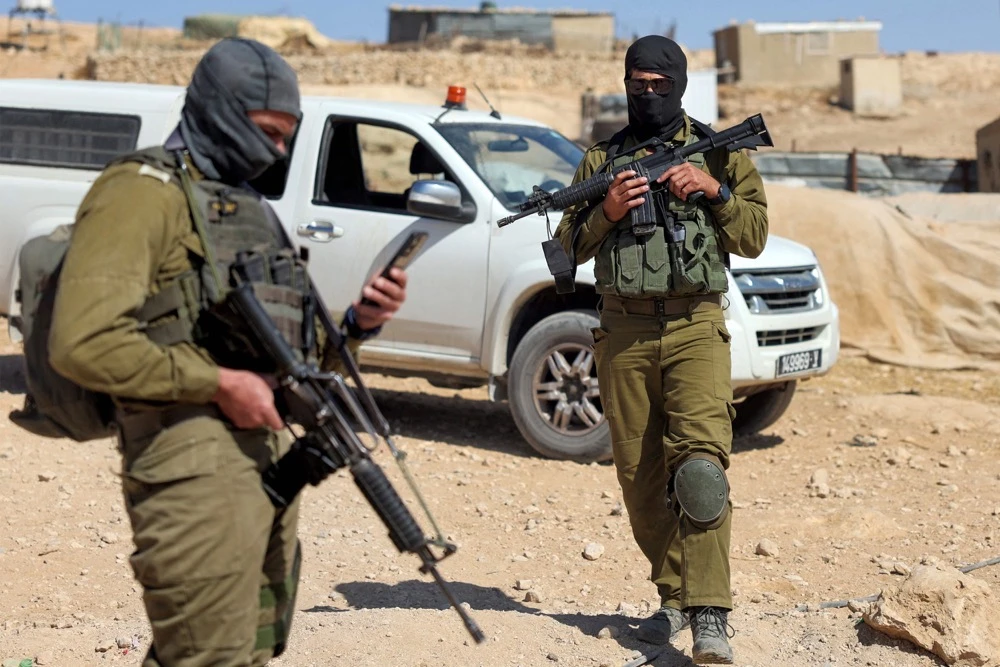 Israeli soldiers patrol in the Palestinian Bedouin village of Tala (Thala), in the occupied West Bank on October 26, 2023, after residents were attacked by Israeli settlers. (AFP/File)