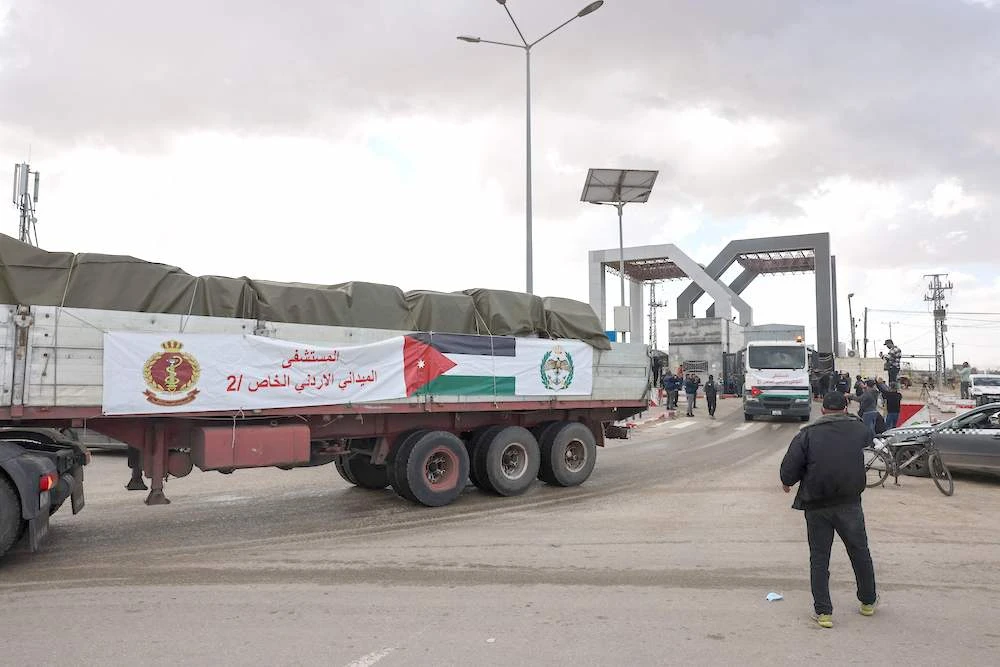An aid convoy transporting a Jordanian field hospital enters the Gaza Strip through the Rafah crossing with Egypt on Nov. 20, 2023. (AFP)