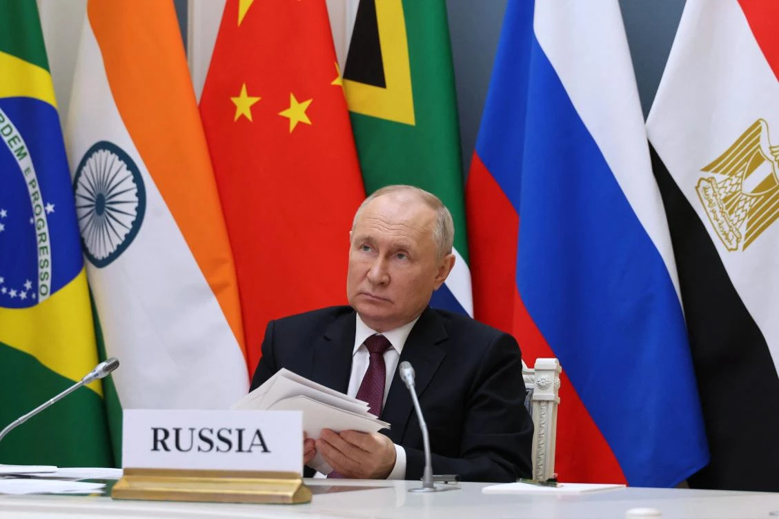 This pool photograph distributed by Russian state agency Sputnik shows Russia’s President Vladimir Putin attending a virtual summit of the BRICS group of nations to discuss the Israel-Hamas war, in Moscow on Nov. 21, 2023. (AFP)