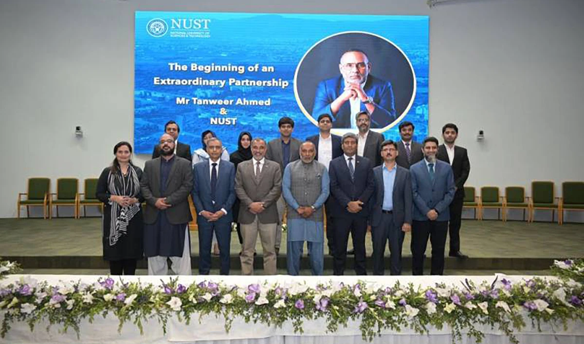 American-Pakistani businessman tycoon Tanweer Ahmed in a group photo with other officials of Islamabad’s National University of Science & Technology (NUST). (Photo courtesy: Daily Pakistan)