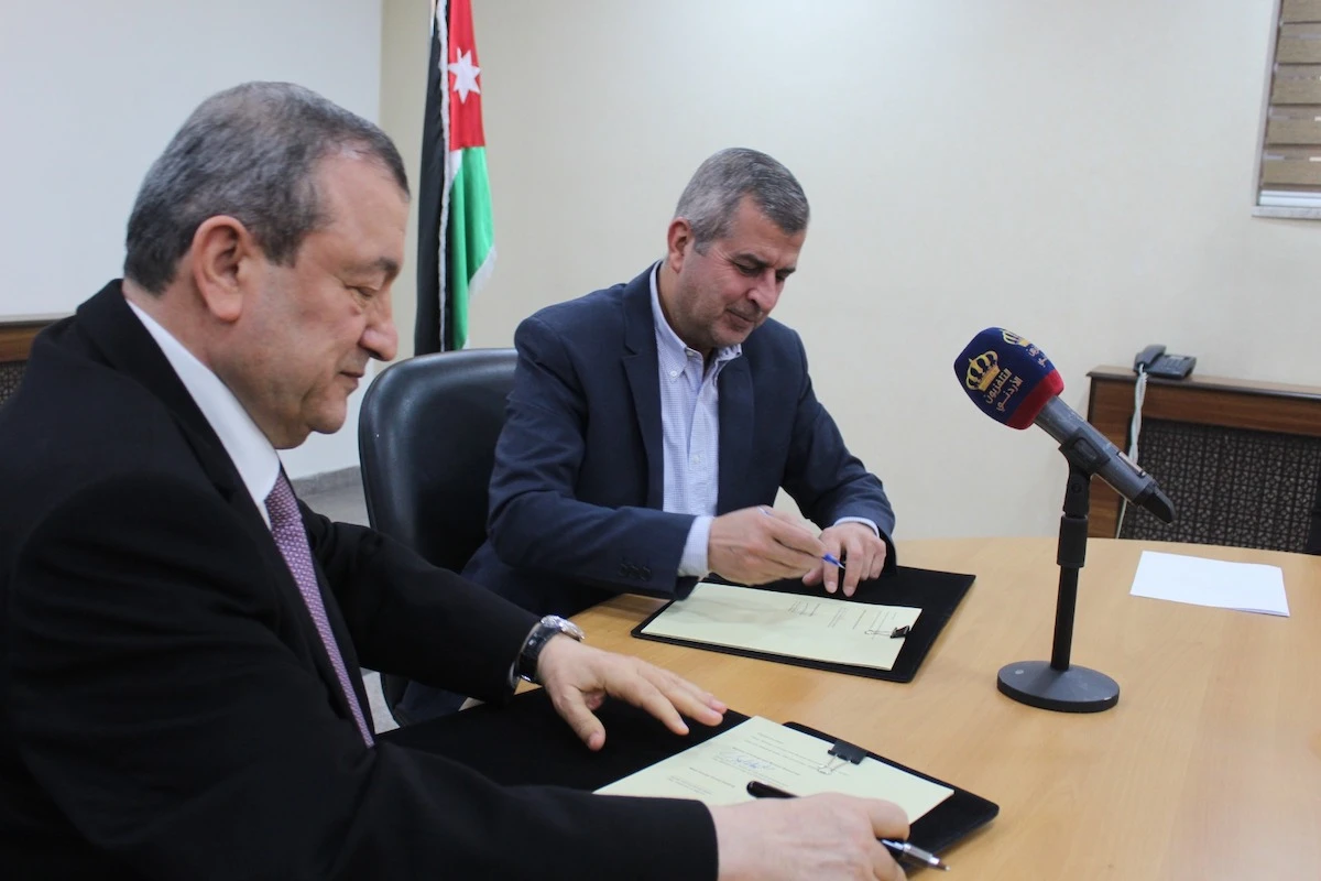 Jordan’s Minister of Energy and Mineral Resources Saleh Kharabsheh and Ahmad Saleh, the chairman of Mass Group Holding. (Petra)