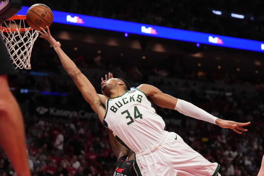 Milwaukee Bucks forward Giannis Antetokounmpo puts up a shot against the Miami Heat during the second half of their NBA game at Kaseya Center Tuesday. (USA TODAY Sports)