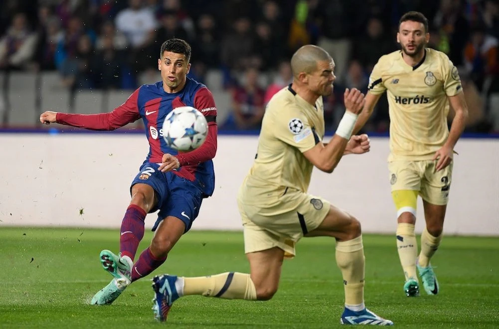 Barcelona’s Portuguese defender Joao Cancelo scores a goal during the UEFA Champions League first round game against FC Porto, Estadi Olimpic Lluis Companys, Barcelona, Nov. 28, 2023. (AFP)