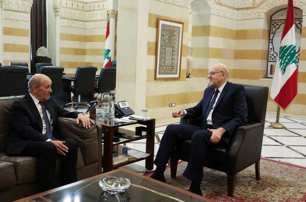 Lebanon’s caretaker Prime Minister Najib Mikati meets with former French Foreign Minister Jean-Yves Le Drian in Beirut, Lebanon, Nov. 29, 2023. (Reuters)