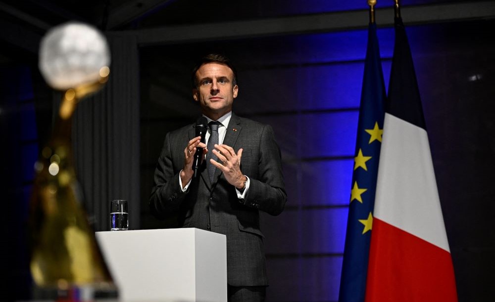 Emmanuel Macron addresses the women’s national handball team of France at the Elysee Palace, Paris, Dec. 18, 2023. (Reuters)