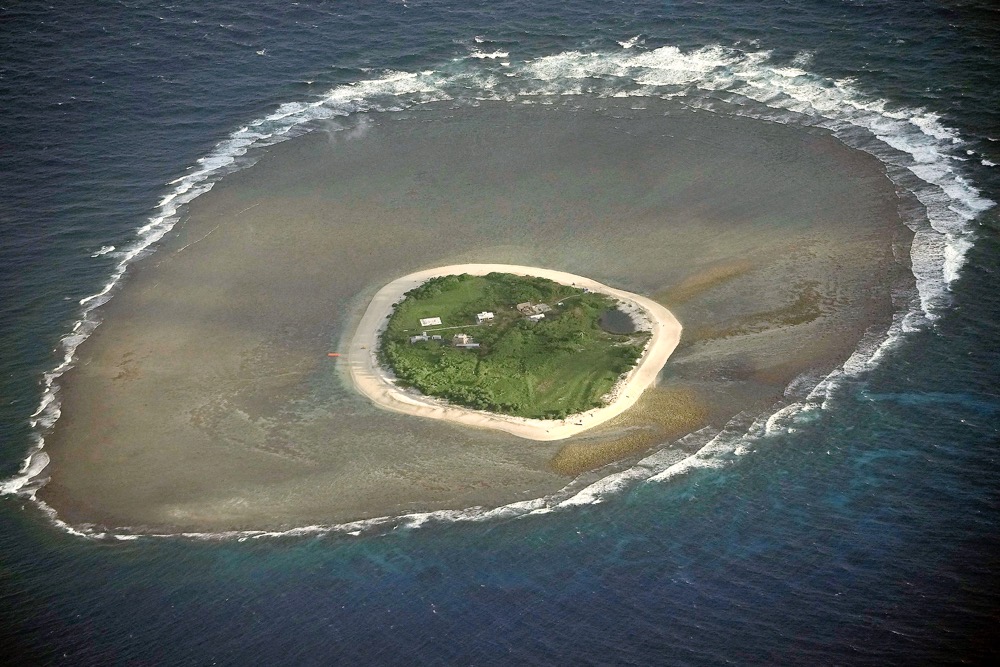 Waves surround the Philippine-occupied Nanshan Island, locally known as Lawak Island at the disputed South China Sea. (AP)