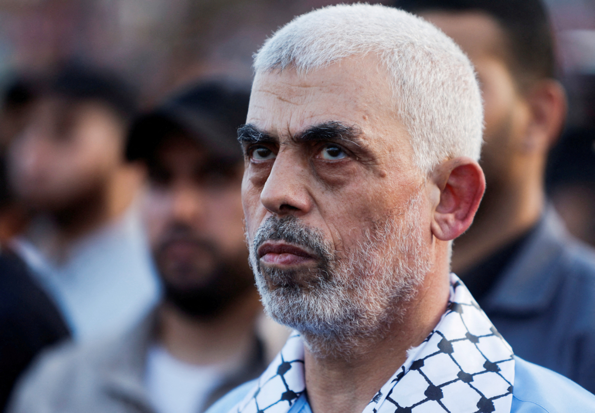 Hamas leader Yehya Al-Sinwar looks on as palestinians Hamas supporters take part in an anti-Israel rally over tension in Jerusalem's Al-Aqsa mosque, in Gaza City October 1, 2022. (REUTERS)