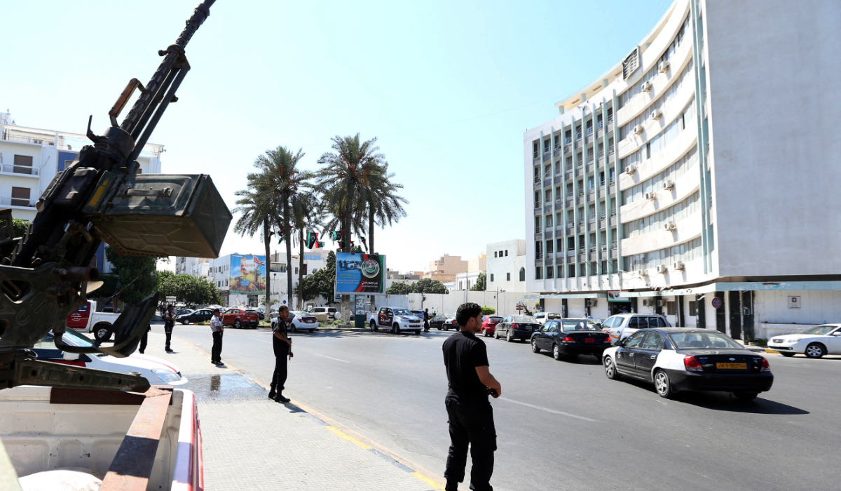 Security men guard the entrance to the Interior Ministry in the Libyan capital, Tripoli, on August 30, 2012. (AFP)