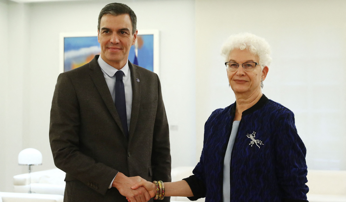 In this handout photograph released by La Moncloa on October 23, 2023 Spanish Prime Minister Pedro Sanchez (L) shakes hands with Israeli Ambassador to Spain Rodica Radian-Gordon prior to holding a meeting at La Moncloa in Madrid. (AFP)