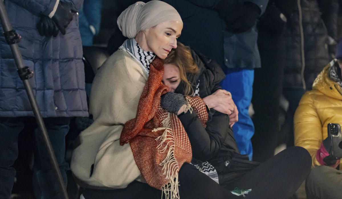 Aida Nackic, left, and Nusaiba Mubarak, listen to speakers during a vigil with state legislators and faith leaders currently on hunger strike outside the White House to demand that President Joe Biden call for a permanent ceasefire in Gaza on Wednesday, Nov. 29, 2023. (AP)