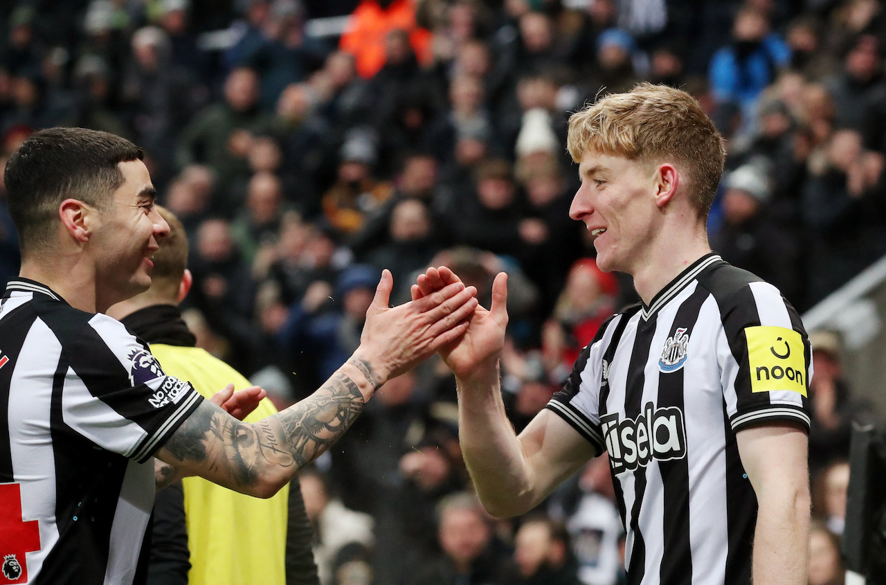 Newcastle United's Anthony Gordon celebrates scoring their first goal with Miguel Almiron (Reuters)