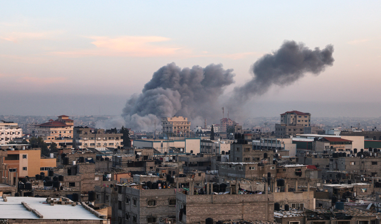 This picture taken in Rafah in the southern Gaza Strip shows smoke rising after an Israeli strike on December 3, 2023. (AFP)
