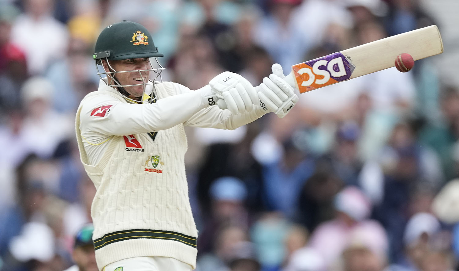 Australia's David Warner plays a shot off the bowling of England's Mark Wood on day four of the fifth Ashes Test match between England and Australia, at The Oval cricket ground in London, on July 30, 2023. (AP/File)