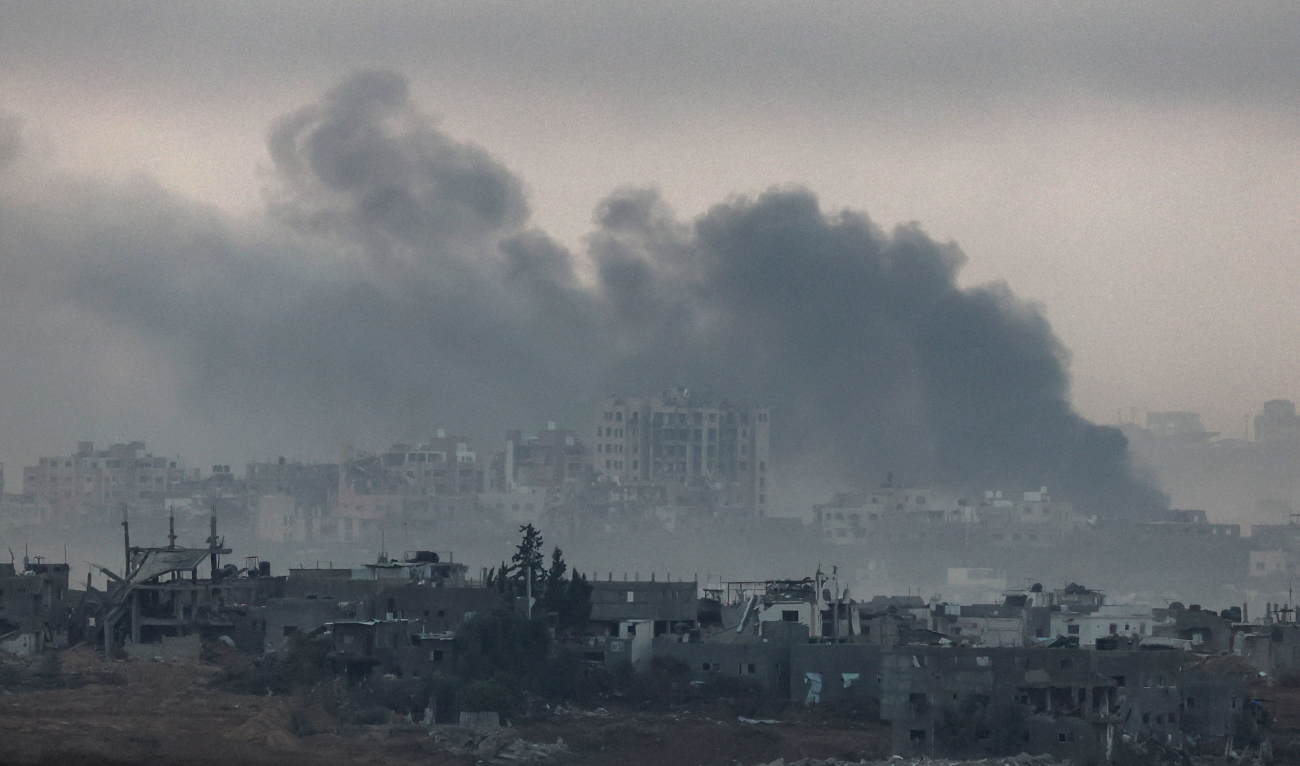 A picture taken from southern Israel near the border with the Gaza Strip on December 4, 2023, shows smoke billowing during Israeli bombardment in Gaza. (AFP/File)