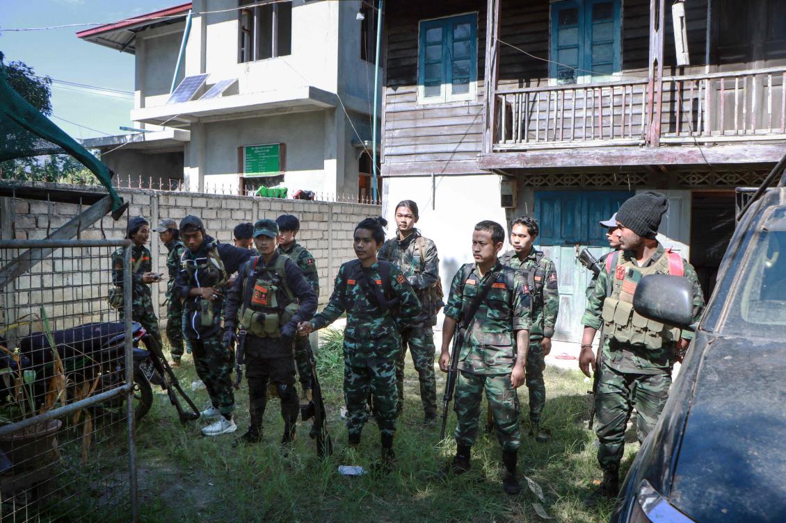 Above, members of the Loikaw People’s Defense Force prepare to go to the frontline near Loikaw in Myanmar’s eastern Kayah state on Nov. 28, 2023. (AFP)