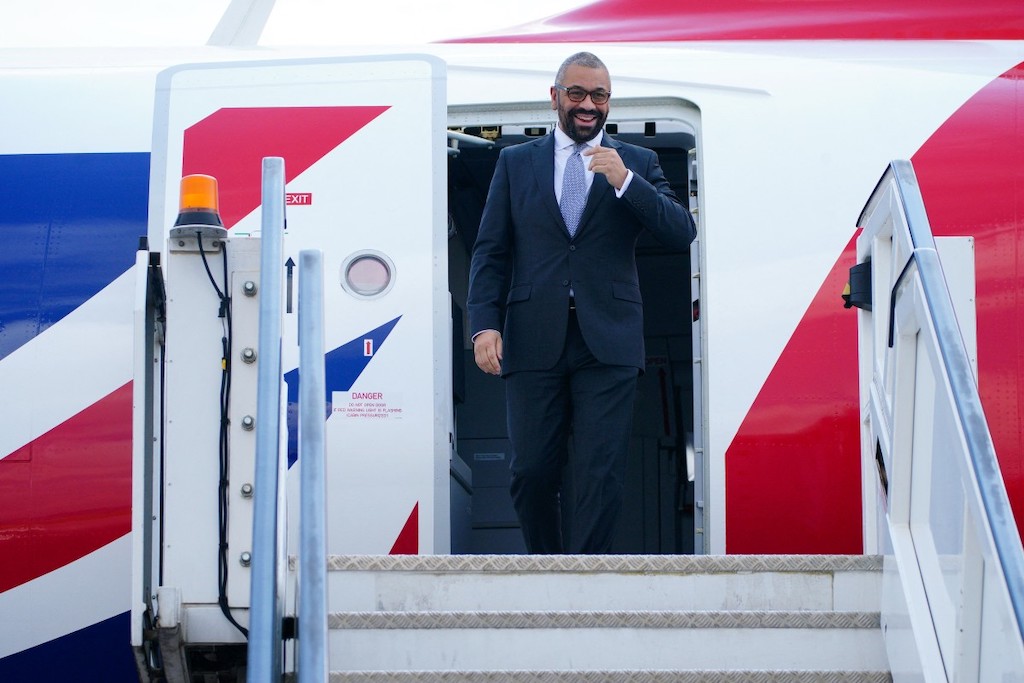 Britain's Home Secretary James Cleverly arrives at Kigali International Airport on December 5, 2023. (AFP)