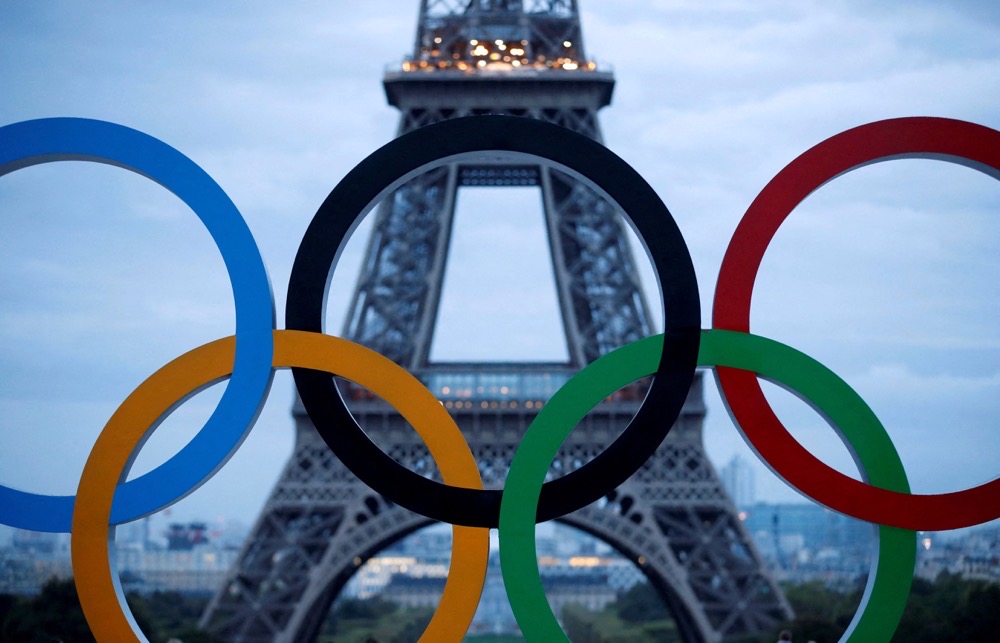 Representatives of international sports federations and national Olympic committees called for Russian and Belarusian athletes to be admitted under a neutral flag for the 2024 Games in Paris “as soon as possible” during the Olympic summit in Lausanne Tuesday. (Reuters)