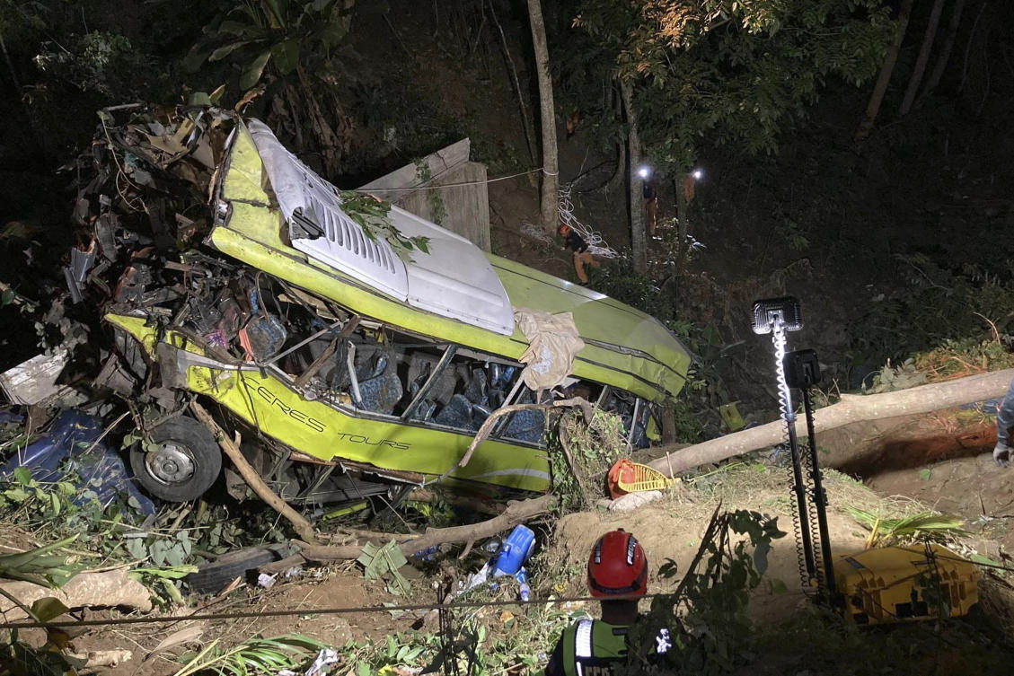 The bus was traveling to Culasi in Antique from the neighboring province of Iloilo when its brakes malfunctioned on a winding road and it plunged 30 meters into the ravine. (Iloilo City Disaster Risk Reduction and Management Office – Urban Search and Rescue Unit via AP)