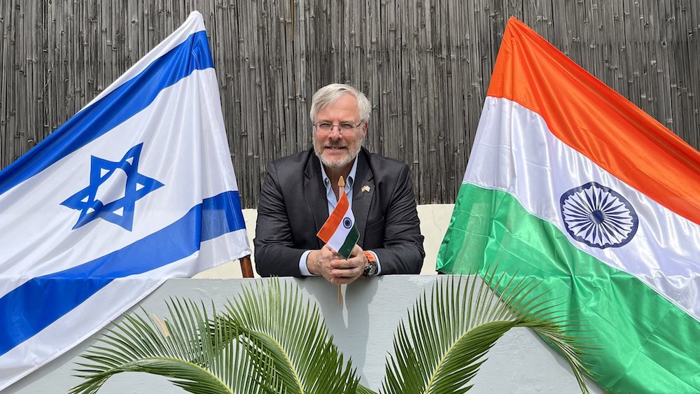 Israel’s ambassador to New Delhi, Naor Gilon, poses with India’s flag in a photo he shared on social media on Aug. 15, 2023. (Naor Gilon)