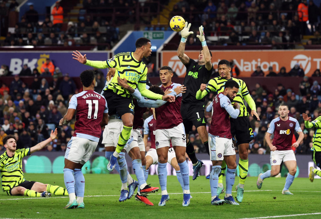 Arsenal’s Gabriel in action with Aston Villa’s Emiliano Martinez during their Premier League match at Villa Park, Birmingham on Dec. 9, 2023. (Reuters)