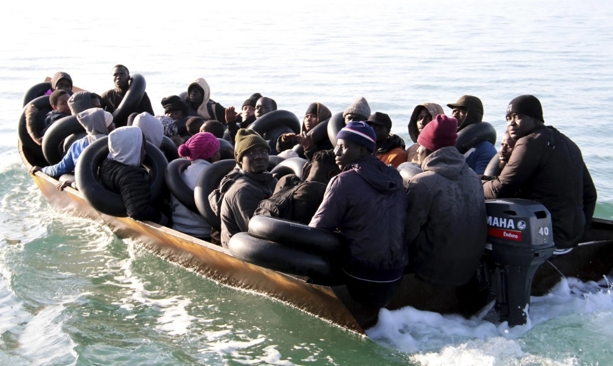 Migrants, mainly from sub-Saharan Africa, are stopped by Tunisian Maritime National Guard at sea during an attempt to get to Italy, near the coast of Sfax, Tunisia. (AP)