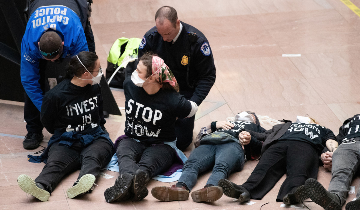 Activists engage in civil disobedience in Hart Senate Office Building, part of the U.S. Capitol complex, to call for a permanent ceasefire in Gaza and redirection of military aid for Israel, in Washington, U.S. December 11, 2023. (REUTERS)