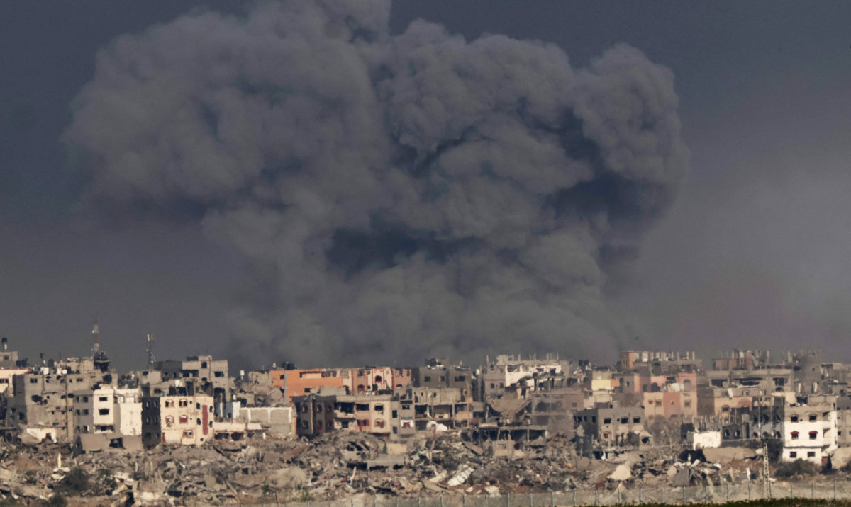 A picture taken from southern Israel near the border with the Gaza Strip on December 12, 2023, shows smoke billowing during Israeli bombardment of the Palestinian territory amid ongoing battles with the Hamas militant group. (AFP)
