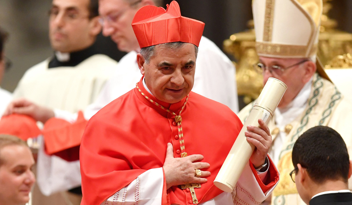 Italian Giovanni Angelo Becciu substitute for General Affairs of the Secretariat of State and special delegate to the Sovereign Military Order of Malta leaves after kneeling before Pope Francis to pledge allegiance and become a cardinal during a consistory for the creation of fourteen new cardinals on June 28, 2018 at St Peter's basilica in Vatican. (AFP)