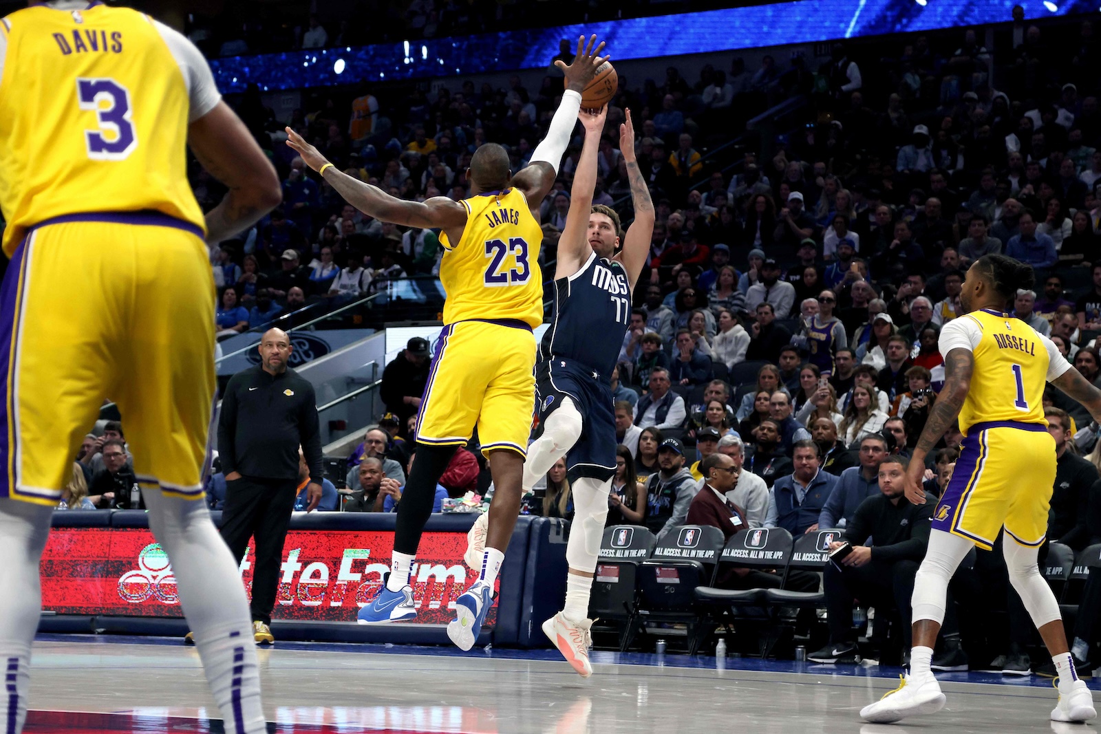 Luka Doncic of the Dallas Mavericks shoots the ball against LeBron James of the Los Angeles Lakers in the second half of an NBA game at American Airlines Center on Dec. 12, 2023 in Dallas, Texas. (AFP)
