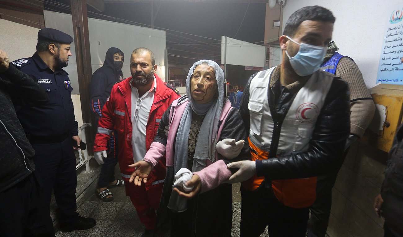 Palestinians wounded in the Israeli bombardment of the Gaza Strip arrive at a hospital in Rafah on Wednesday, Dec. 13, 2023. (AP)