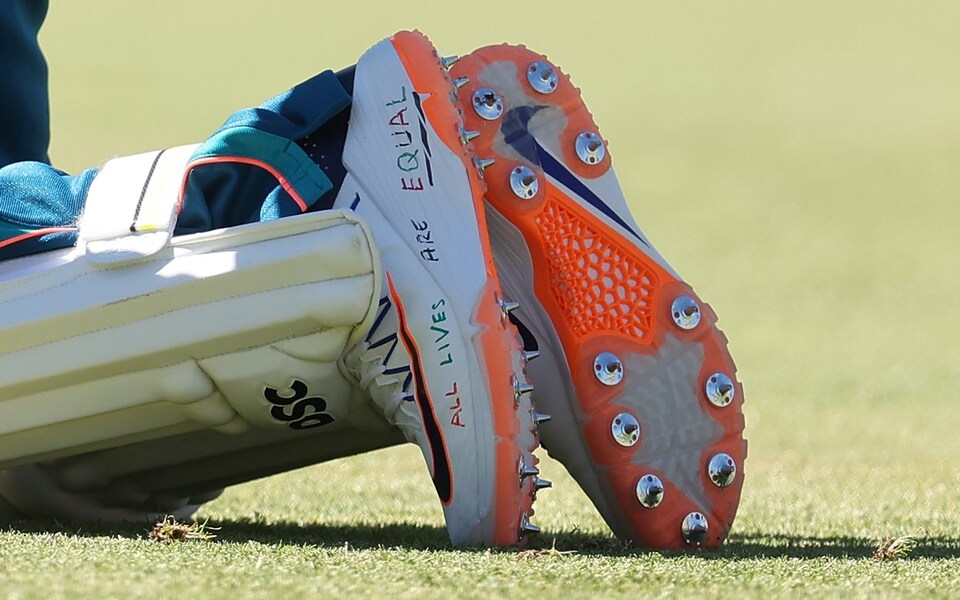 Usman Khawaja's spikes emblazoned with slogans referencing the plight of Palestinians in Gaza. (Getty)