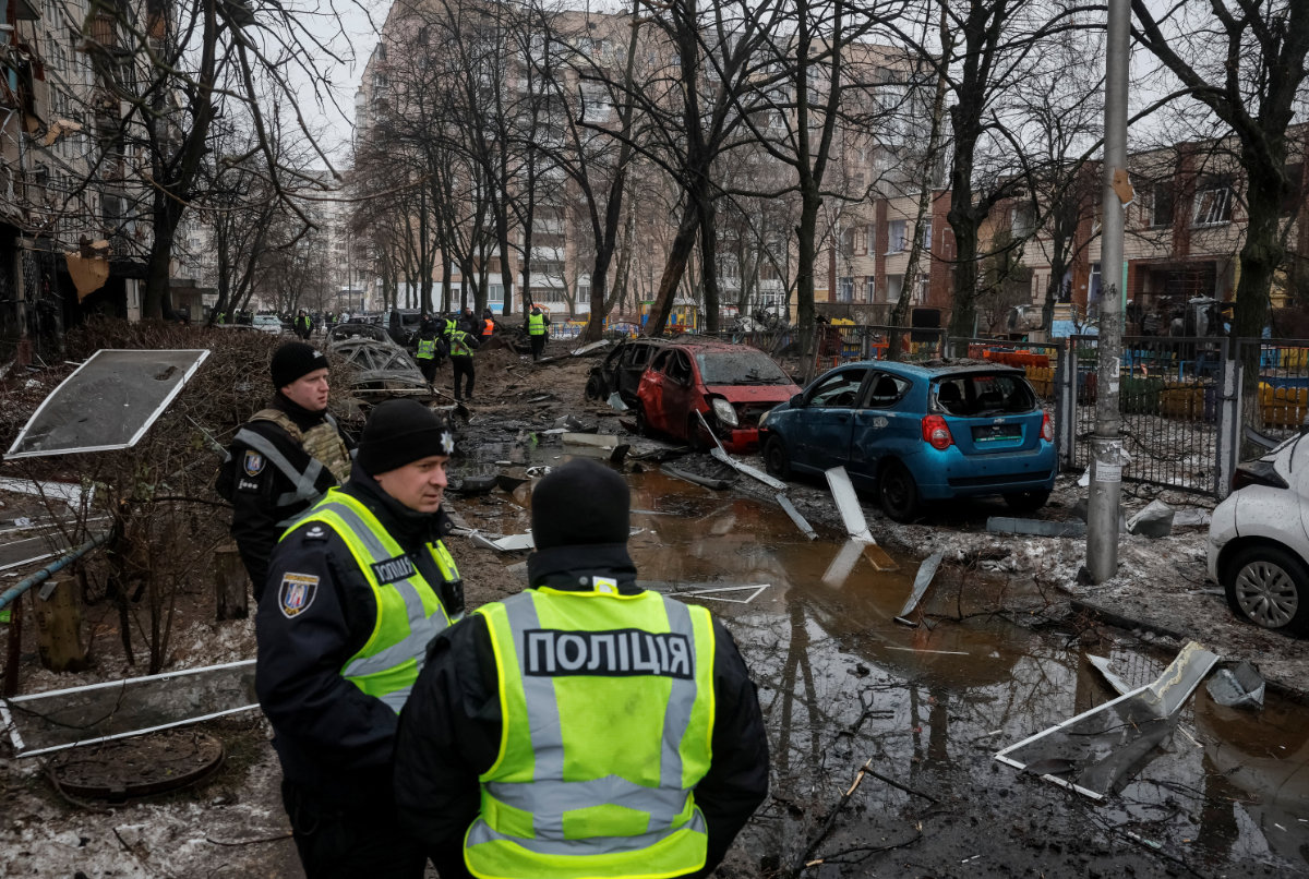 Police guard at site where an apartment building was damaged during a Russian missile strike in Kyiv, Ukraine, on December 13, 2023. (REUTERS)