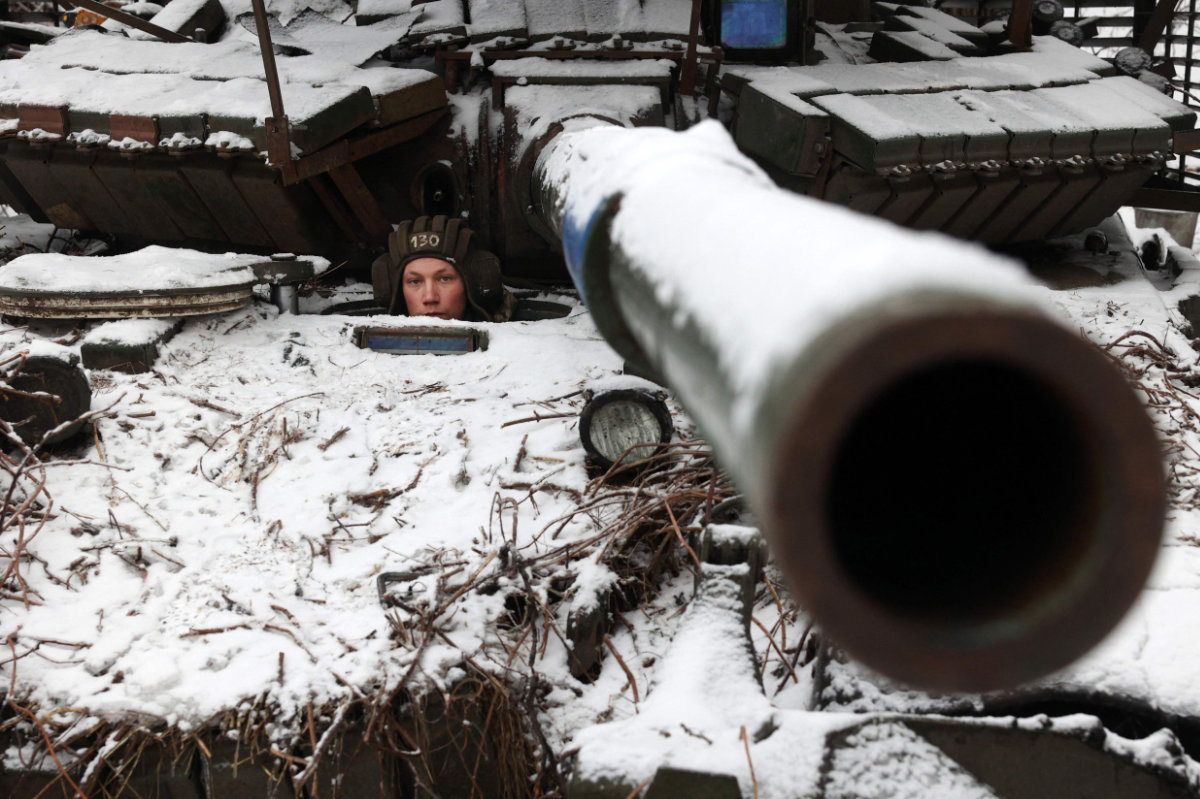 A Ukrainian soldier looks out from a tank as he holds his position near to the town of Bakhmut, Donetsk region, on December 13, 2023, amid the Russian invasion of Ukraine. (AFP)