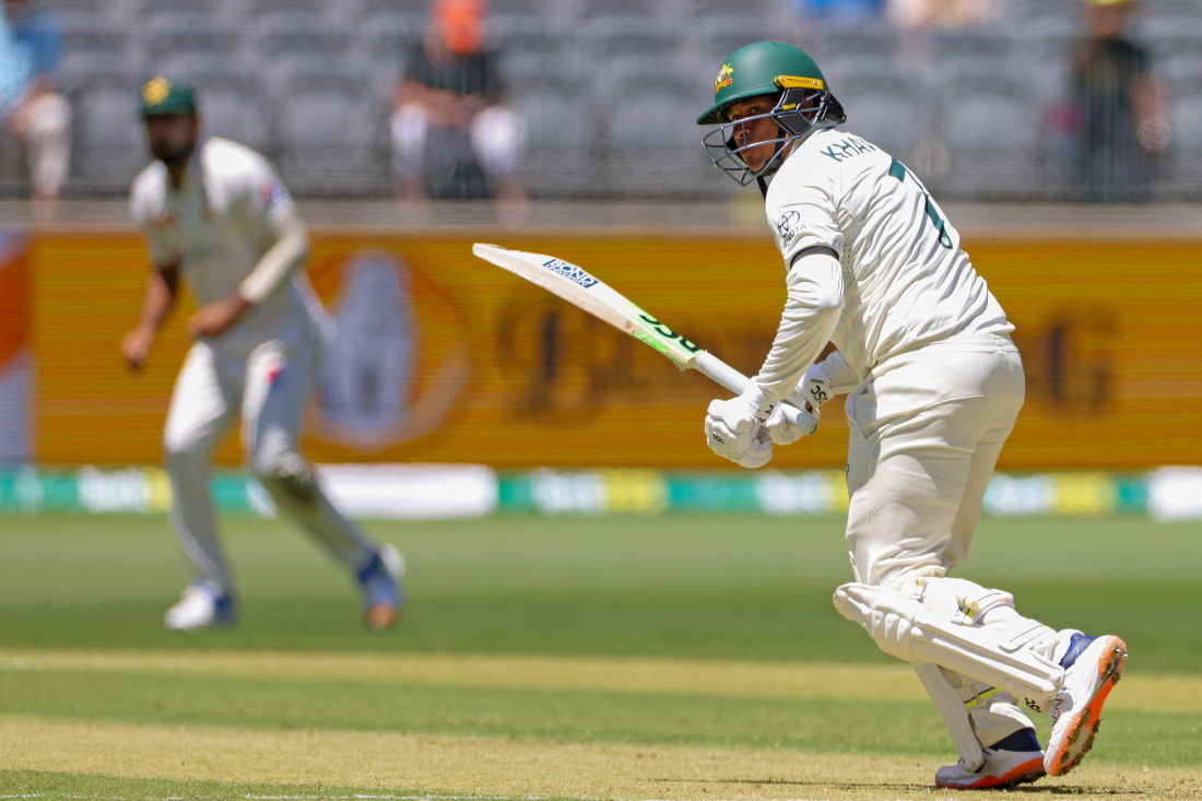 Usman Khawaja of Australia bats on the first day of the first cricket test between Australia and Pakistan in Perth, Australia. (AP)