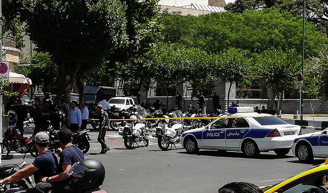 A picture taken on June 7, 2017 shows police vehicles and motorcycles outside Iranian parliament in the capital Tehran. (Photo courtesy: AFP/File)