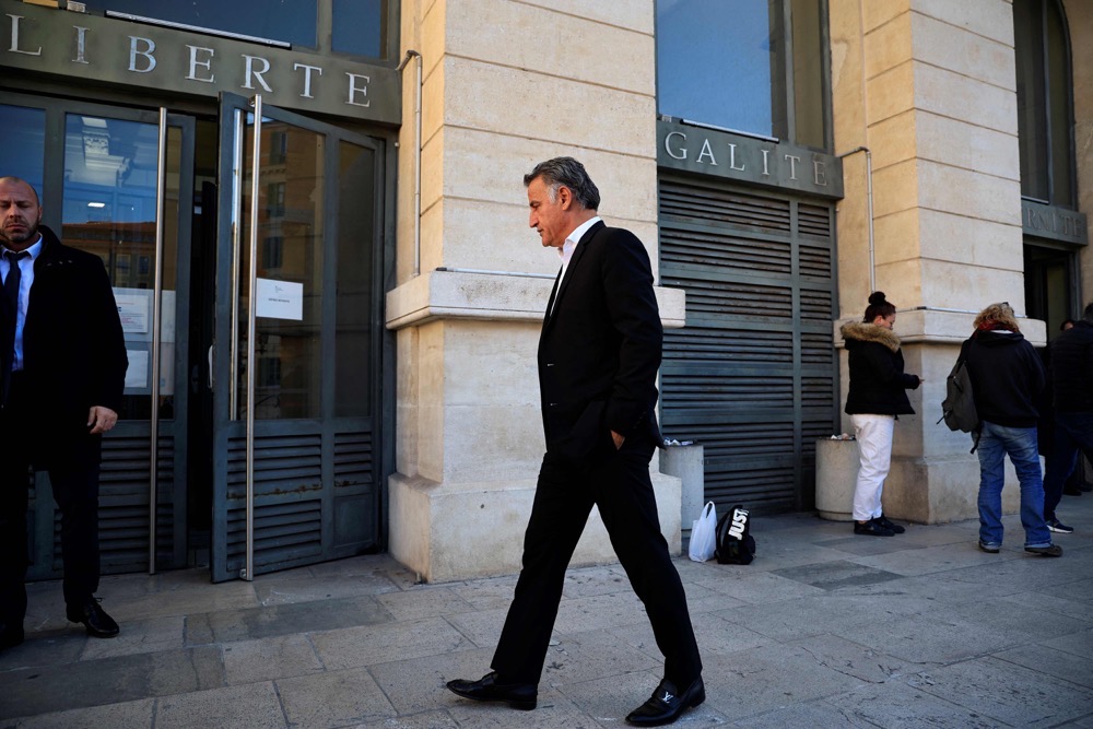 Former coach of OGC Nice Christophe Galtier is seen outside Nice's courthouse, south-eastern France, on Dec. 15, 2023, during a break of his trial over harassment and discrimination on the grounds of race or religion. (AFP)