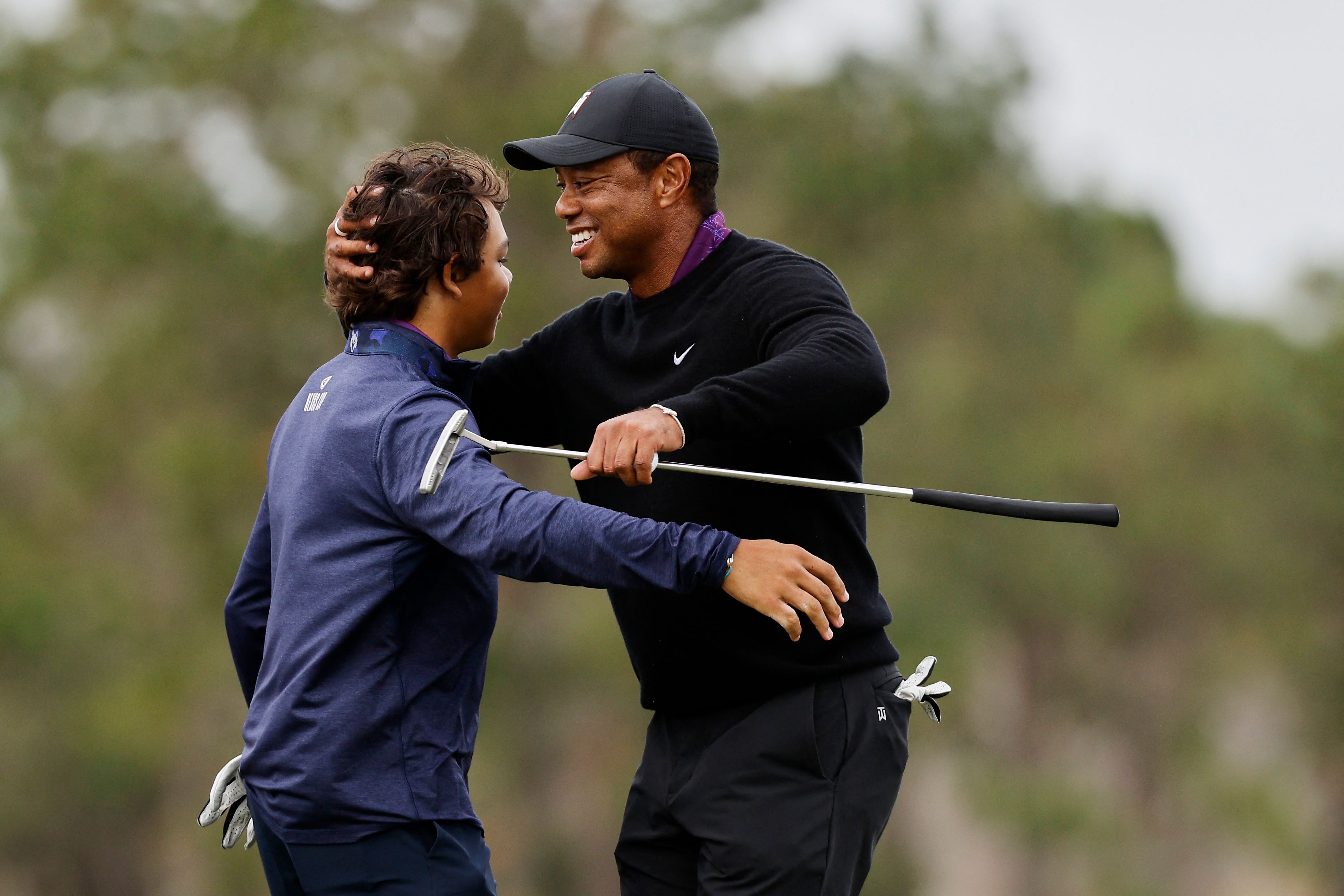 Tiger makes pro-am walk ahead of title hunt with son Charlie
