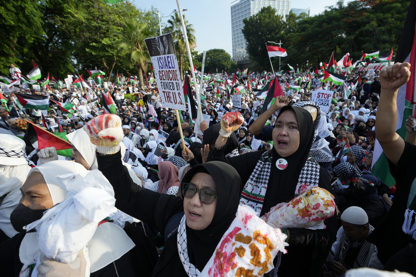 Protesters chant during a rally in support of the Palestinian people outside the US Embassy in Jakarta, Indonesia on Dec. 17, 2023. (AP)