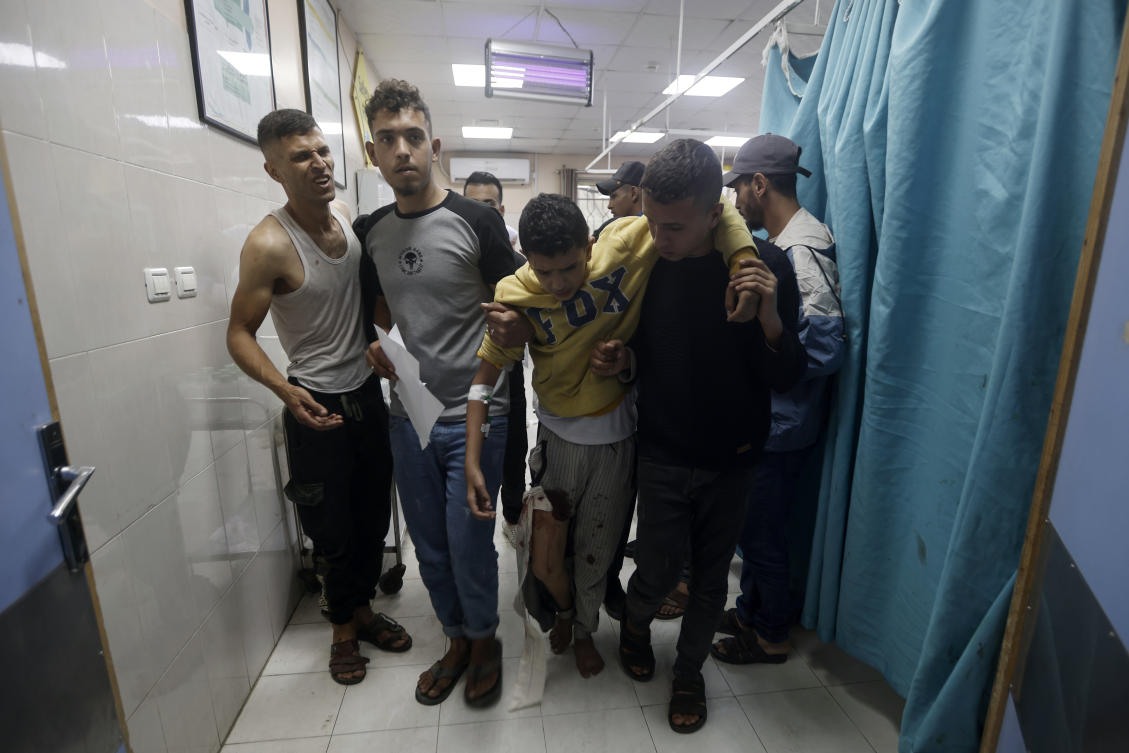 Palestinians wounded in Israeli airstrikes on a UN-run school arrive at the Nasser hospital in the town of Khan Younis, southern Gaza Strip on Sunday, Dec. 17, 2023. (AP)