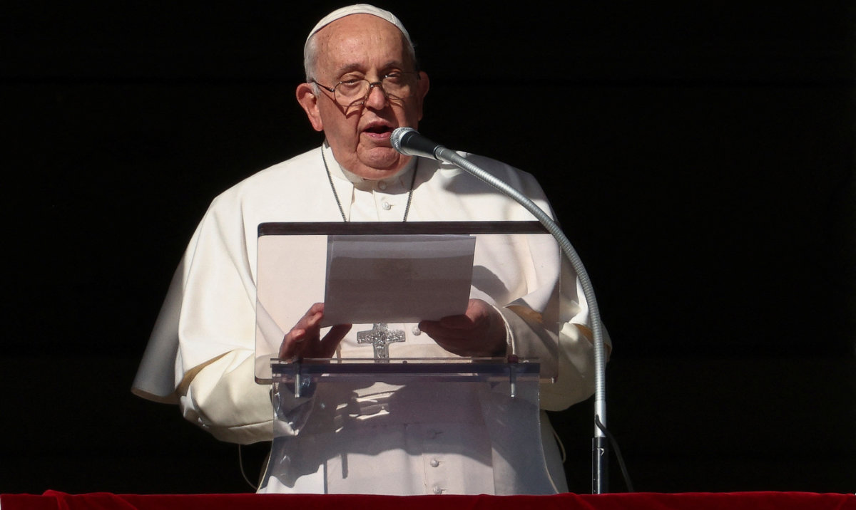 Pope Francis leads the Angelus prayer from his window, at the Vatican, December 17, 2023. (Reuters)