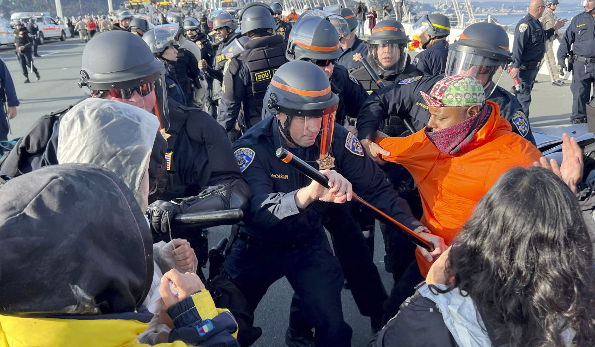 Demonstrators clash with police as arrests are made after shutting down the San Francisco Oakland Bay Bridge in conjunction with the APEC Summit taking place Thursday, Nov. 16, 2023, in San Francisco. (AP)