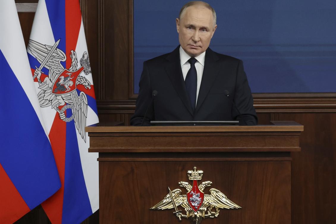 Russian President Vladimir Putin speaks at a meeting with the top military brass in Moscow on Dec. 19, 2023. (AP)