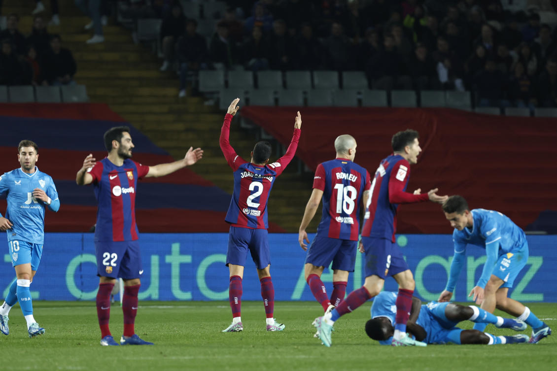 Barcelona need late goal to beat last-place Almeria 3-2 in Spanish league, end winless streak