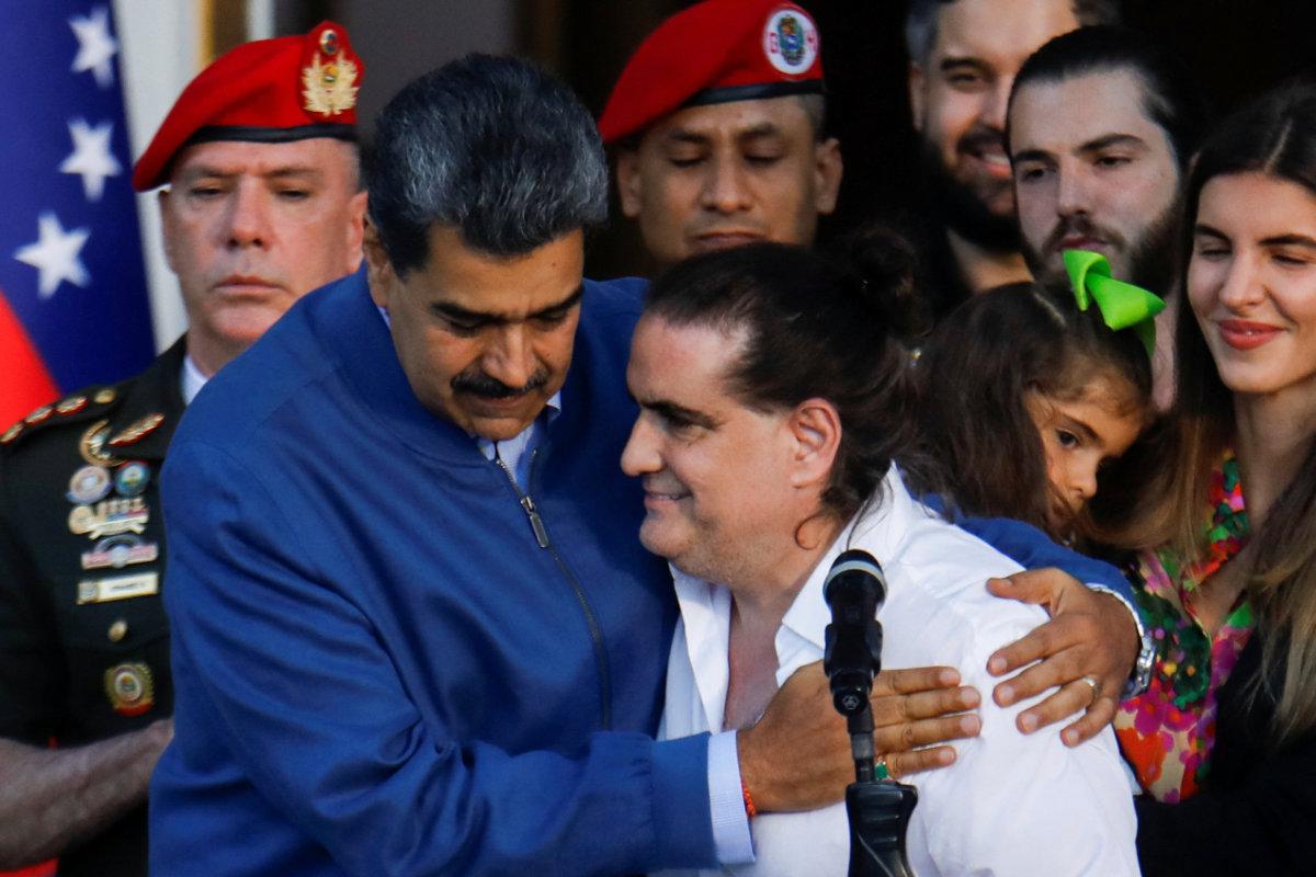 Venezuelan President Nicolas Maduro receives his ally Alex Saab at the Miraflores Palace in Caracas on December 20, 2023. Saab was released by the US government as part of a prisoner swap. (Reuters)